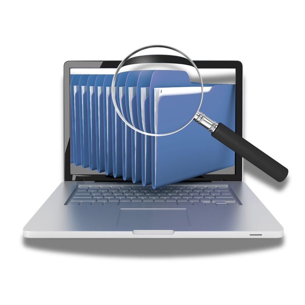 Australian company registration and ASIC compliance audit visual featuring a laptop and magnifying glass over business filing folders to represent professional accounting and corporate secretarial services.